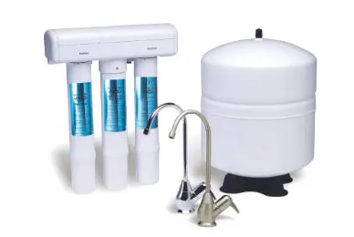 A water filter system with three filters and a faucet.